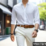 페라가모 슬림 벨트와 클래식 벨트 비교 - A sophisticated urban fashion scene featuring a young Japanese man wearing a slim, lightweight leath...